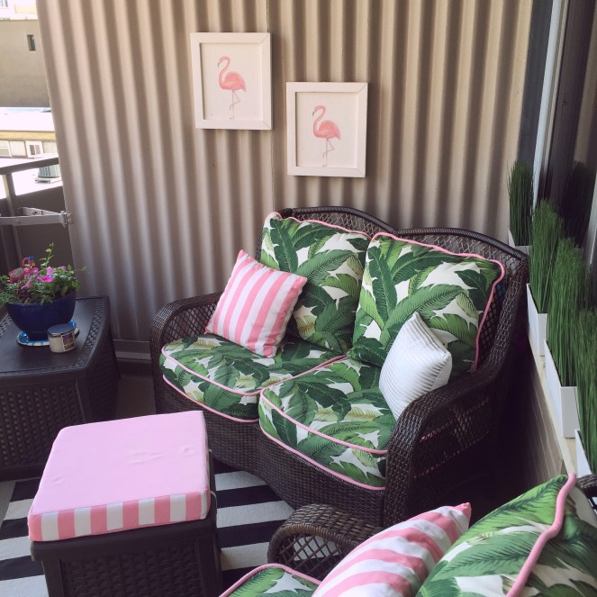 Chicago Balcony, Chicago Balconies, City Balcony, Beverly Hills Hotel, Palm tree inspiration, Palm print patio, Pink and white stripes, tropical patio, mid-century modern, Blogger DIY, DIY balcony makeover, palm print sofa, banana leaf patio furniture, Sarah In Style, My outdoor oasis, Flamingo prints, flamingo inspired