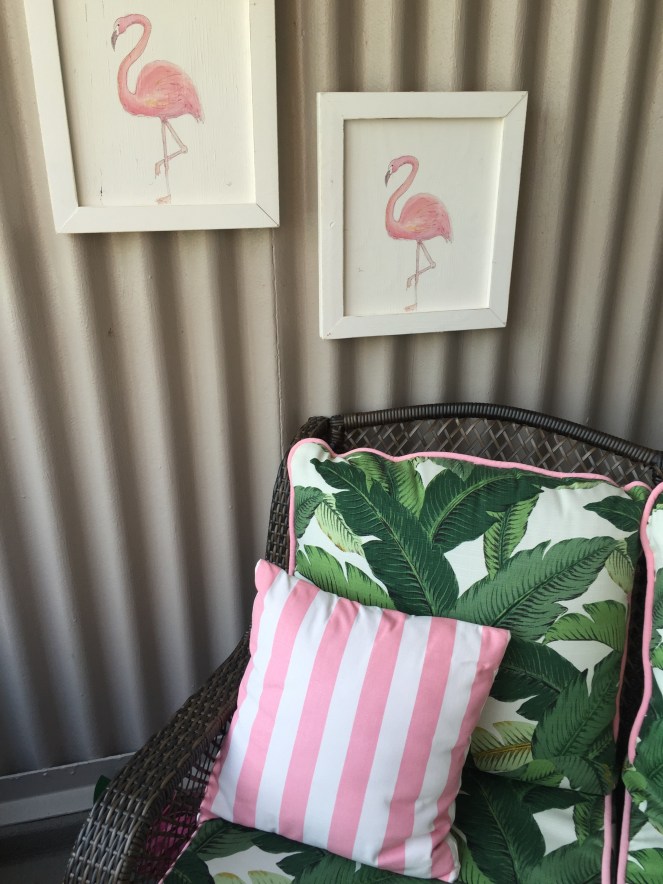 Chicago Balcony, Chicago Balconies, City Balcony, Beverly Hills Hotel, Palm tree inspiration, Palm print patio, Pink and white stripes, tropical patio, mid-century modern, Blogger DIY, DIY balcony makeover, palm print sofa, banana leaf patio furniture, Sarah In Style, My outdoor oasis, Flamingo prints, flamingo inspired