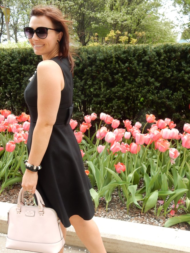 Chicago Millenium Park, Chicago Loop, The Bean, Cloudgate, Kate Spade, Chicago, downtown Chicago, chitown, sarah in style, little black dress, lbd, bow dress, bow earrings, pearls, sarah meyer, 100 years young, springtime, tulips, fresh, life 
