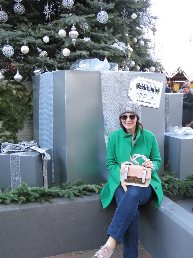 chicago ice rinks, Chicago ice skating, Christmas Market, Chriskindlemarket, Christkindlmarket, chicago traditions, chicago, chicago christmas, the park at wrigley, what to do in chicago this weekend, chicago activities, sarah in style, sarahinstyle.com, sarah meyer, family traditions, pink ruffled sweater, green jcrew coat, wrigley field, daley plaza, naperville