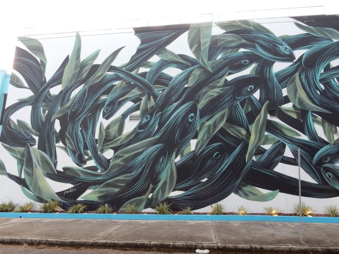 Tampa art, Tampa murals, Murals, Mural Art, St. Petersburg Murals, St. Pete Murals. St. Pete art, Florida art, street art. Sarah In Style, Sarah Meyer, St. Petersburg Florida, unique vacation ideas, vacation like a local, soft surroundings, pink sandals, lime green dress, tassel sandals