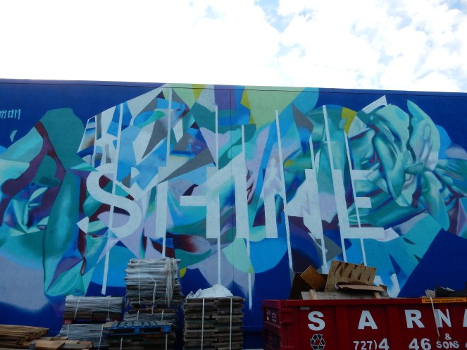 Tampa art, Tampa murals, Murals, Mural Art, St. Petersburg Murals, St. Pete Murals. St. Pete art, Florida art, street art. Sarah In Style, Sarah Meyer, St. Petersburg Florida, unique vacation ideas, vacation like a local, soft surroundings, pink sandals, lime green dress, tassel sandals