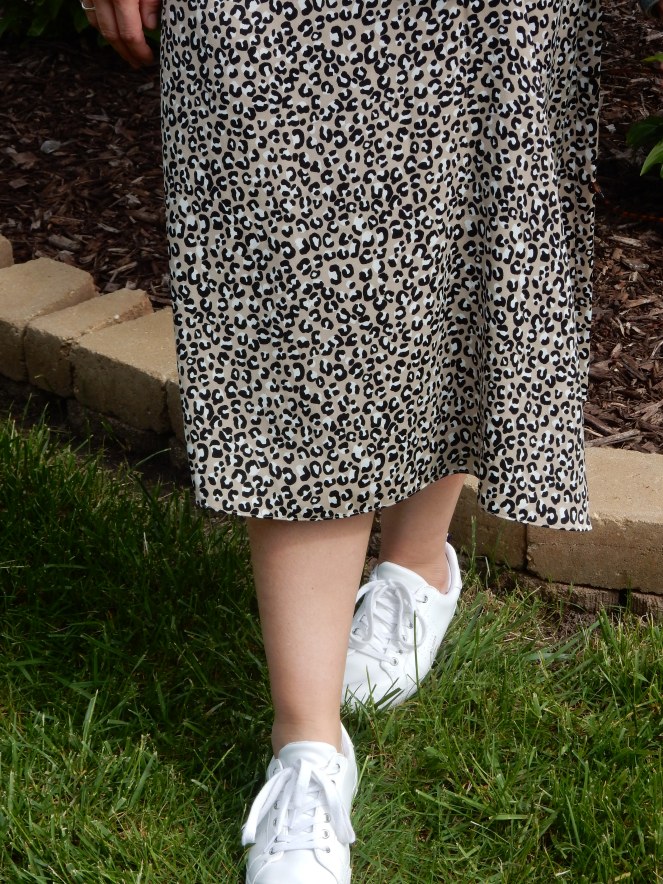 oversized denim jacket, ruffled denim jacket, leopard skirts, perfect summer skirts, classic summer fashion, cute skirts, Who What Wear, Macy's Herald Sqaure, initial necklace, emerald green, pleated skirt, compleat in emerald, jewel tone fashion, jewel tone skirts, Bomber jacket, leopard sneakers, soft surroundings sneakers, cropped sweater, Chicago fashion 2020, fashion trends 2020, spring fashion trends, spring fashion 2020, spring must have clothing, midi skirt, midi skirts, midi-skirt, best skirts for spring, cute midi skirts, cute skirts, classic fashion pieces, versatile clothing, styling tips, transitional clothing, flattering skirts, flattering bottoms, fashion blogger style tips, what to wear, who what wear, What I wore, Sarah Meyer, Sarah In Style, leopard midi skirt, sneakers and skirts, francesca's sunglasses