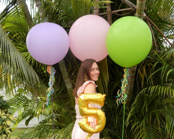 Sarah In Style. SarahInStyle.com, Sarah Meyer, Sarah's Blog, Blogaversary, Blog Birthday, Best Fashion Blogs, Best Travel Blogs, Best Design Blogs, Best Lifestyle Blogs, Top Chicago Bloggers, 5 balloon, big party balloons, Best DIY Blogs, Best Chicago Bloggers, Celebrate Good Times, Pink Ruffled Jumpsuit, Rhinestone sunglasses, Retro sunglasses, parrot earrings, colorful earrings