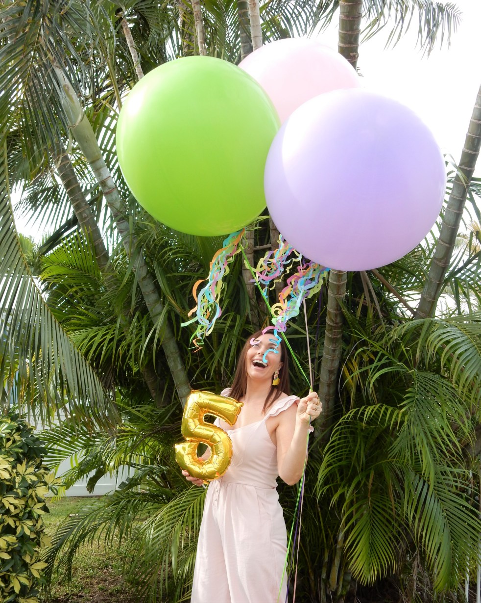 Sarah In Style. SarahInStyle.com, Sarah Meyer, Sarah's Blog, Blogaversary, Blog Birthday, Best Fashion Blogs, Best Travel Blogs, Best Design Blogs, Best Lifestyle Blogs, Top Chicago Bloggers, 5 balloon, big party balloons, Best DIY Blogs, Best Chicago Bloggers, Celebrate Good Times, Pink Ruffled Jumpsuit, Rhinestone sunglasses, Retro sunglasses, parrot earrings, colorful earrings