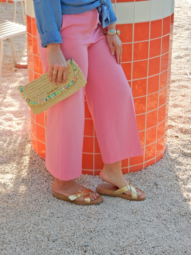 Sarah In Style, SarahInStyle, SarahInStyle.com, Sarah Meyer, Fashion Blog, Fashion Blogger, Chicago Fashion Blogger, Florida Fashion Blogger, Fashion Inspiration from blogs, What to wear in spring, Spring 2021 Fashion, Spring 2021 Fashion Trends, Styling bright pants, pink pants, colorful spring pants, colorful spring wardrobe, classic chambray button down, joules hat, pink sunglasses, lilly pulitzer sandals, gold criss cross sandals, chunky gold jewelry, fashion inspiration for spring, what to wear in Florida in spring, Whitney's Florida, Whitney's Longboat Key, retro fashion shoot, mid-century modern in Florida, Classic spring looks, Classic spring fashion, styling tips from bloggers, retro gas station, best restaurants in Sarasota, mid-century sarasota, what to do in Sarasota, Where to eat near Sarasota