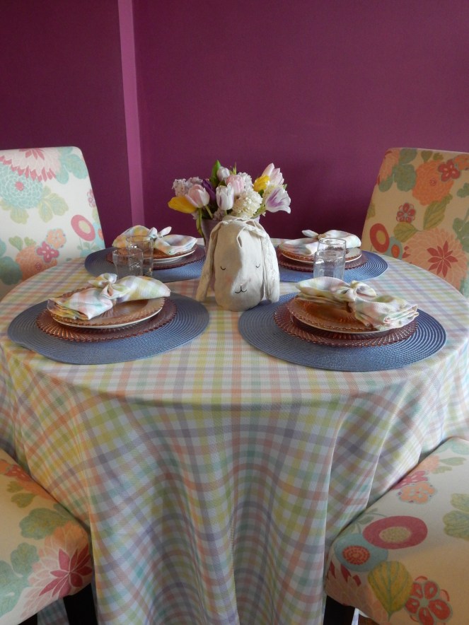 Sarah In Style, SarahInStyle.com, Sarah Meyer, Dining Decor, Hoppy Easter, Easter Table, Easter Decorating, Easter Decorations, Easter tablescapes, Spring tablescapes, spring tablescape, decorating for Easter, incorporating family traditions, where did the easter bunny originate, where is the easter bunny from, why do we hide easter eggs, cute table decor, miss america depressrion glass, pink miss america glass, plaid tablecloth, plaid napkins, bow napkin rings, table decorating ideas, wedding shower tables, baby shower tables, springtime decor. Easter 2021, Bed Bath and Beyond tableware