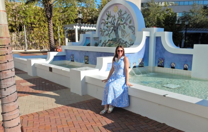 Lilly Pulitzer Mermaid Dress, Blue and White Lilly Pulitzer Dress, Lilly Pulitzer Chrisella Dress, Lilly Pulitzer mermaid print, mermaid pattern dress, Chic in blue and white, pink sunglasses, bold statement necklaces, blue and green gem necklace, Florida, fashion, Southern style, perfect country club dress, country club fashion, beach chic, perfect summer dress, belted shirt dress, most flattering dress, summer fashion 2021, summer style 2021, mermaid meaning, what do mermaids symbolize, Sarah In Style, SarahInStyle.com, Sarah Meyer, Chicago fashion blogger, fashion blogger summer style, Florida fashion blogger, Sarasota fountains, Sarasota waterfront, Sarasota blogger, adult mermaid dress