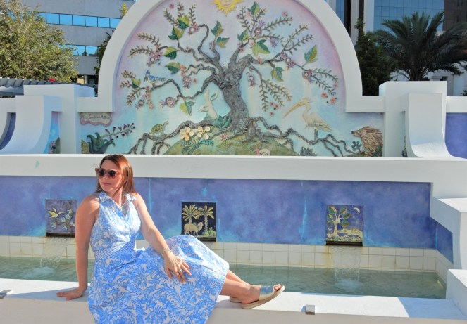 Lilly Pulitzer Mermaid Dress, Blue and White Lilly Pulitzer Dress, Lilly Pulitzer Chrisella Dress, Lilly Pulitzer mermaid print, mermaid pattern dress, Chic in blue and white, pink sunglasses, bold statement necklaces, blue and green gem necklace, Florida, fashion, Southern style, perfect country club dress, country club fashion, beach chic, perfect summer dress, belted shirt dress, most flattering dress, summer fashion 2021, summer style 2021, mermaid meaning, what do mermaids symbolize, Sarah In Style, SarahInStyle.com, Sarah Meyer, Chicago fashion blogger, fashion blogger summer style, Florida fashion blogger, Sarasota fountains, Sarasota waterfront, Sarasota blogger, adult mermaid dress