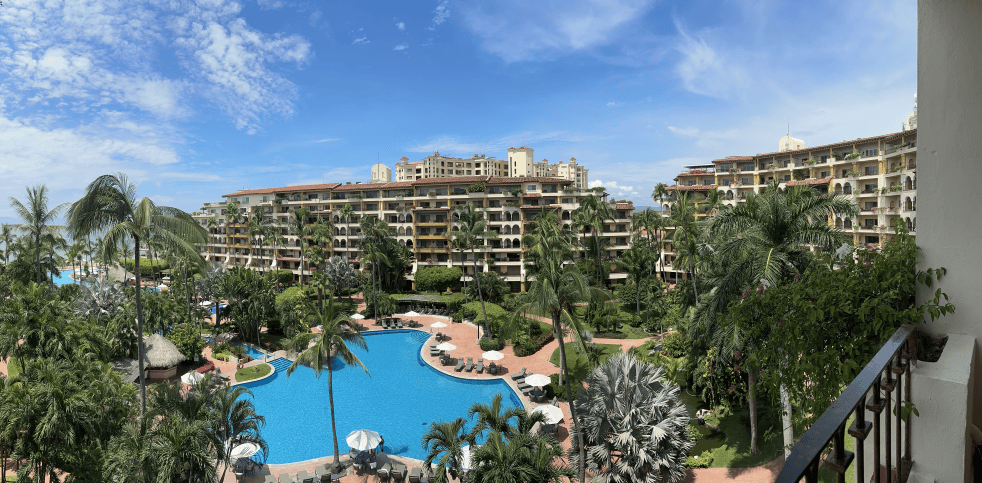 Tropical landscaping and colorful flowering balconies at Velas Vallarta luxury resort