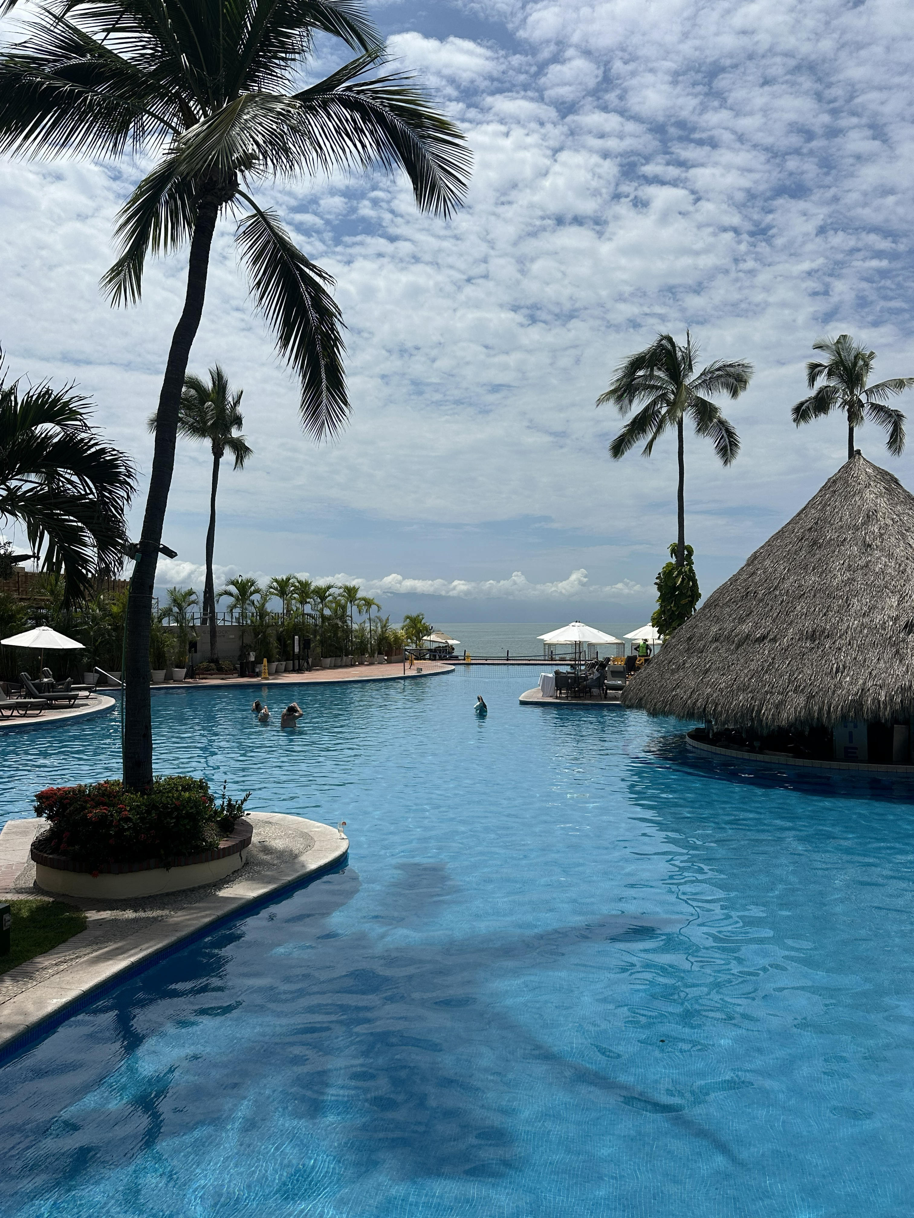 wimming pools surrounded by tropical gardens at Velas Vallarta all-inclusive resort